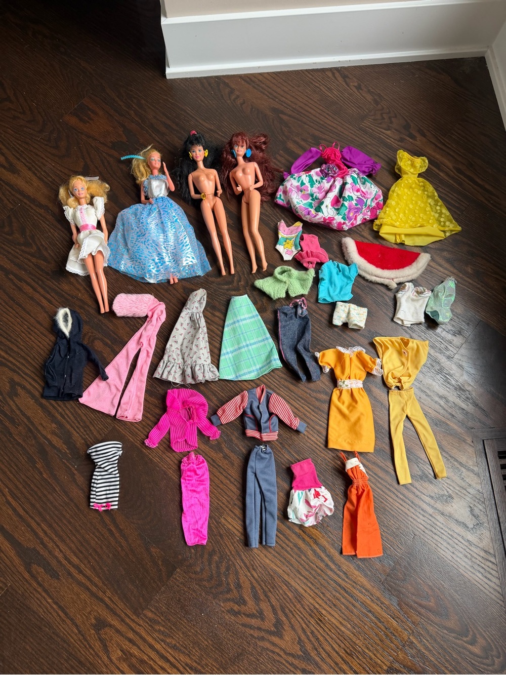 Lot of vintage Barbie clothes/ Barbies
